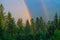 A beautiful natural phenomenon, two rainbows against the backdro