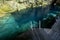 beautiful natural pool of crystal clear water formed a rocky cave with stalagmites and stalagmites in Varadero, Cuba named Saturno