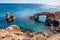 Beautiful natural rock arch near of Ayia Napa, Cavo Greco and Protaras on Cyprus island, Mediterranean Sea. Legendary bridge