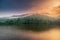 Beautiful Natural Scenic of Lake and Mountain at Sunrise, Landscape Nature View of Campsite at Morning Sunlight. Outdoor Leisure