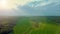 Beautiful nature, aerial drone view on rural countryside landscape, shining sun sunset sky horizon Ver 3