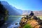 Beautiful nature background with unidentified hiker at Segara Anak Lake in early morning.