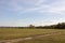 Beautiful nature dirt road with grass and sunny day with blue sky