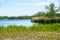 Beautiful nature landscape the lake and grass field