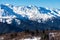 Beautiful nature lanscape with Caucasus mountain and pine forest covered with snow in winter. Cable car at Hatsvali ski resort