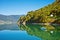 Beautiful Nature Norway natural landscape with fjord, boat and mountain.