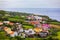 Beautiful nature view on Azores with small villages, tows, green nature fields. Amazing Azores. View of typical Azores village in