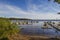 Beautiful nature water landscape view on summer day. Wooden boats parking on lake coast.