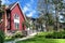 Beautiful new contempory suburban attached townhomes with colorful summer gardens in a Canadian neighborhood.