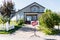 beautiful new house with sign sold standing