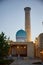 The beautiful new madrasah minaret and the dome of the in Samarkand