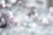 Beautiful New Year blurred defocused silver, pale pink, gray background. Magical Christmas bokeh