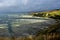 Beautiful New Zealand landscape near Kaikoura, South Bay, with the ocean and landscape under a clouded sky