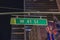 Beautiful night city view of tops of buildings and West 41st Street sign. New York.