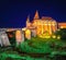 Beautiful night panorama of the Hunyad Castle / Corvin`s Castle with wooden bridge