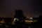 Beautiful night summer suburban landscape with storm and lightning