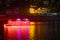 Beautiful night view of colorful cruise ships traveling on River