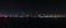 Beautiful night view of Dubai skyscrapers from the sea. Night panorama of Dubai Marina