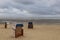 Beautiful North Sea coast of Cuxhaven in Germany. Overcast sky with clouds over the sea at low tide