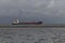 Beautiful North Sea coast of Cuxhaven in Germany. Overcast sky with clouds over the sea at low tide