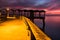 A beautiful ocean dramatic sunset and fishing pier