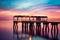 A beautiful ocean dramatic sunset and fishing pier