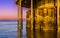 Beautiful ocean scenery from under the jetty of Blankenberge beach, Belgium, Sunset with a colorful sky