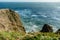 Beautiful ocean view from the edge of the cliffs on Kamchatka Peninsula, Russia. Deep blue sea water of Pacific ocean, beach with