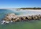 The beautiful ocean water and rocky beach near Fort Desoto Park, St Petersburg, Florida, U.S.A