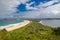 Beautiful ocean waves and sand surface at palm beach view with blue sky cloudy day from up the Hill at Barrenjoey headland, Sydney