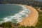 Beautiful ocean waves and sand surface at palm beach view from up the Hill at Barrenjoey headland, Sydney, Australia.