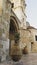 Beautiful old ancient tower with arch and plants of St.Lazarus church in Larnaca
