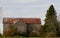 Beautiful old barn with rusty roof