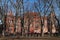 Beautiful Old Brick Monitor Elementary School Building seen from a Park in Greenpoint Brooklyn New York