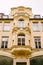 Beautiful old building with patterned balconies in Max Joseph Platz, Munich