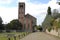 A beautiful old church and a wall with capers through the hills in the Veneto (Italy)