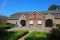 Beautiful old dutch brick stone country farm house, blue summer sky