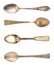 Beautiful old gold spoons isolated on white. Retro silverware