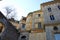 Beautiful old medieval stone yellow buildings in trastevere in Rome