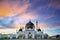 Beautiful old mosque during sunset with colorful sky