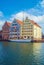 Beautiful Old Town in Gdansk with granaries and white sailship