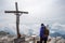 The beautiful old wooden summit cross of Mount Lagazuoi in the Dolomite Alps, autonomous province of South Tirol