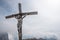 The beautiful old wooden summit cross of Mount Lagazuoi in the Dolomite Alps, autonomous province of South Tirol