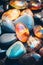 Beautiful opal stone pebbles background. Vertical background with colorful stones, phone screensaver