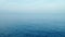 Beautiful open sea nature blue sea surface in summer season white clouds and blue sky footage from drone aerial view. Nature