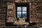 Beautiful open wooden window shutter with flowers reflecting blue sky