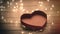 Beautiful opened heart shaped box and garland on the wonderful b