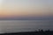 Beautiful orange and blue dusk at sicilian milazzo town beach