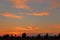 Beautiful orange bright sunset with blue sky and wonderful cloud