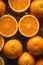 Beautiful oranges whole and sliced glistering with dew water droplet. flat lay top view